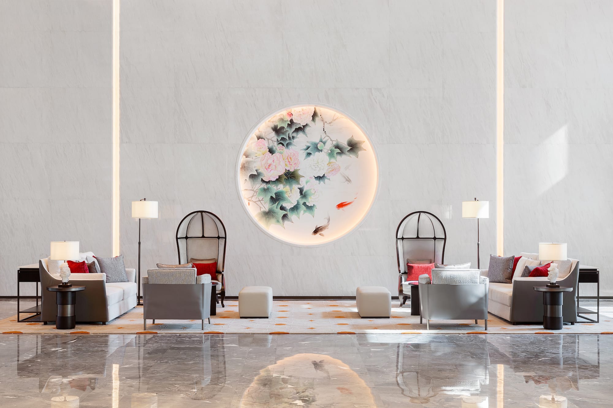 a room with chairs and a round wall