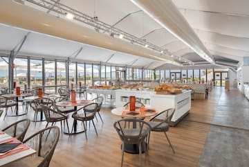 a room with tables and chairs