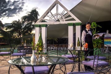 a woman standing at a table
