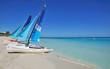 a sailboat on a beach