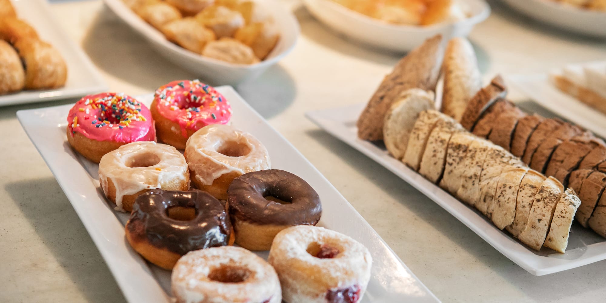 a plate of donuts and pastries