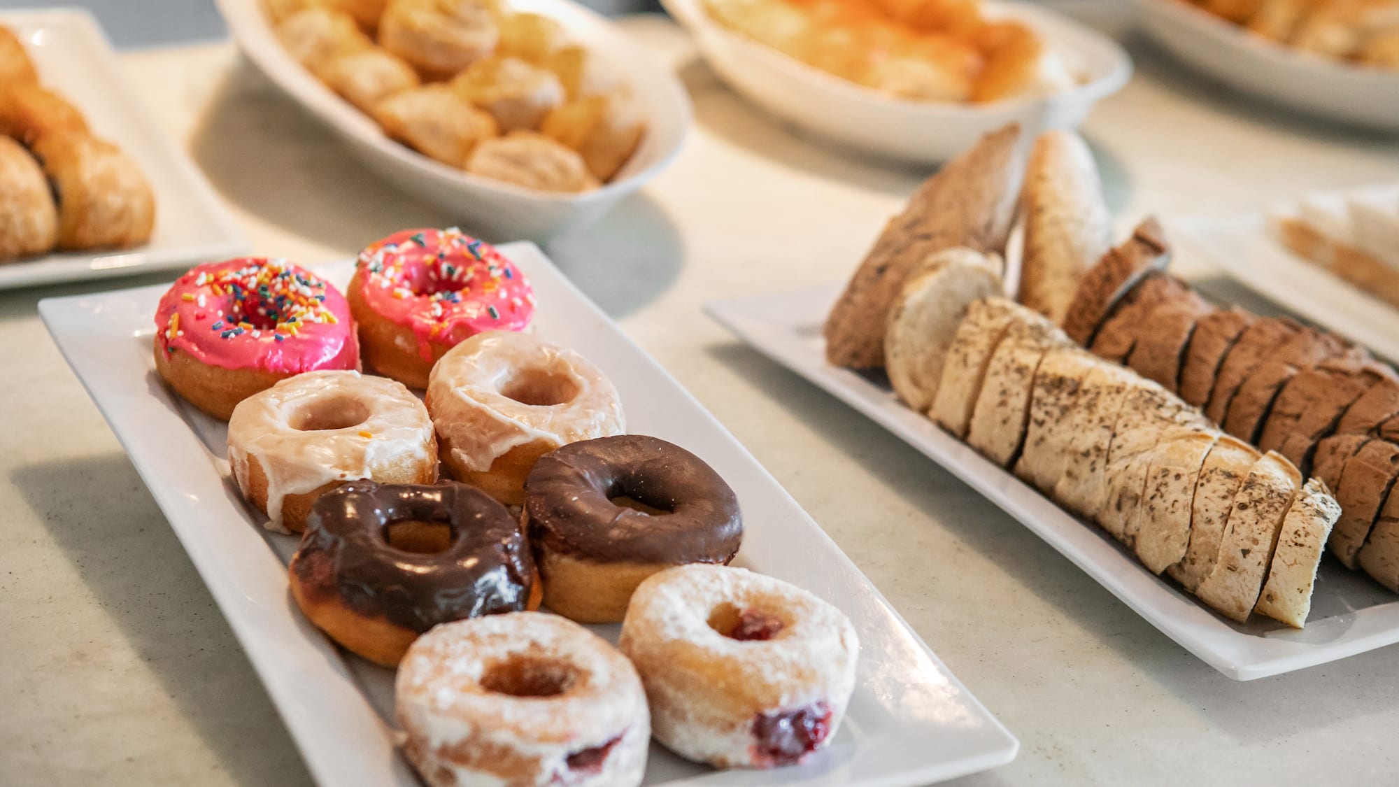 a plate of donuts and pastries