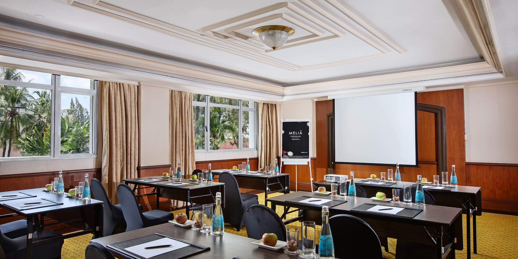 a room with tables and chairs