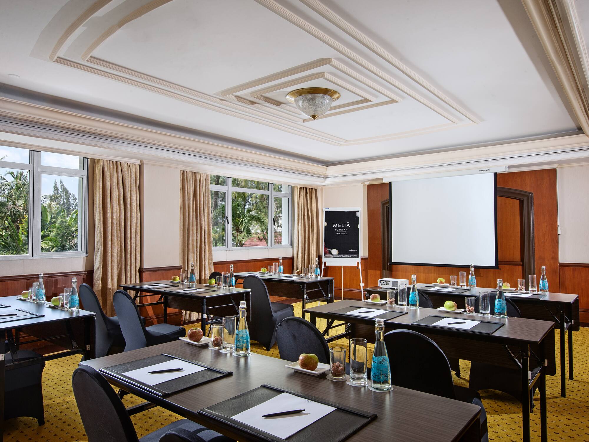 a room with tables and chairs