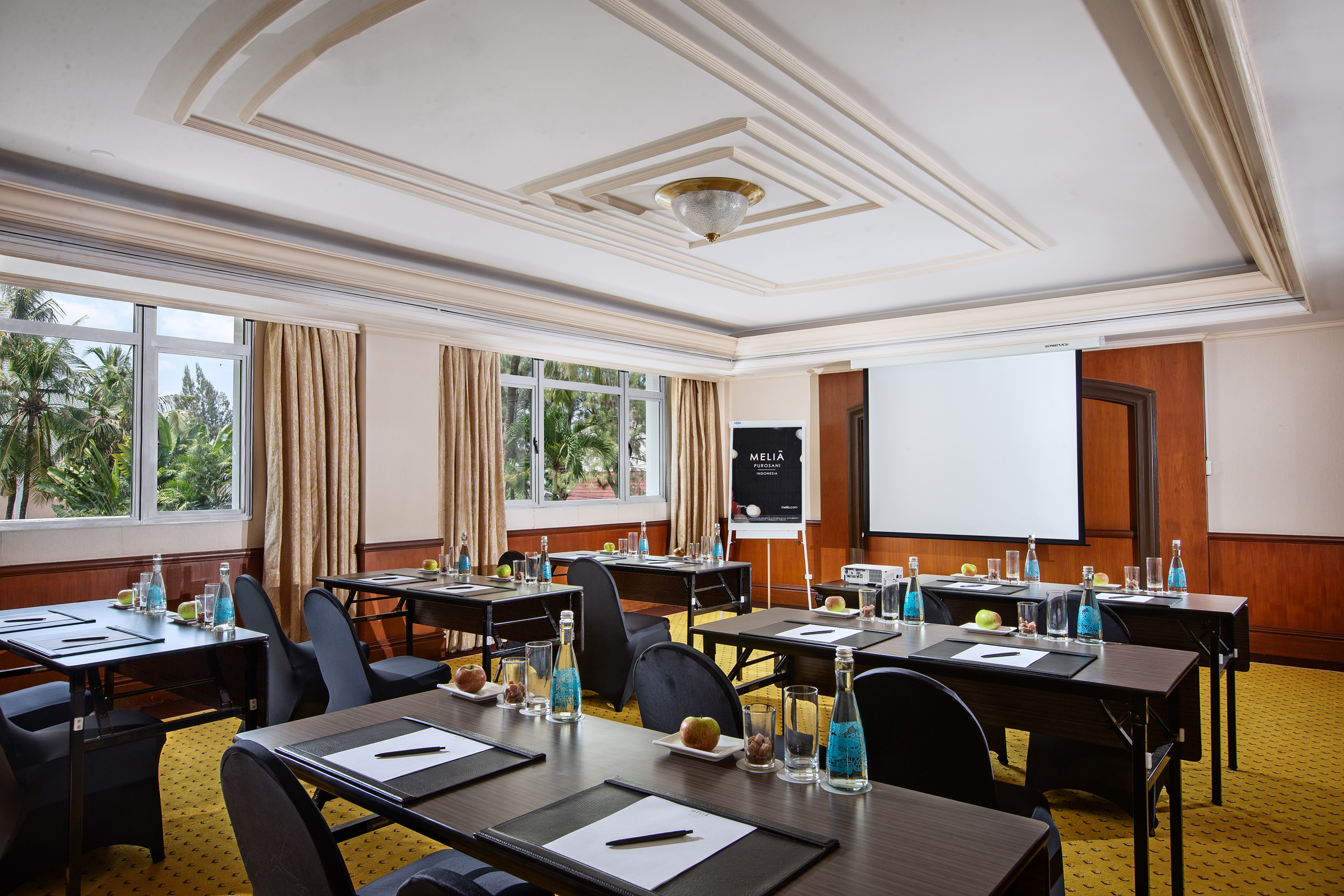 a room with tables and chairs