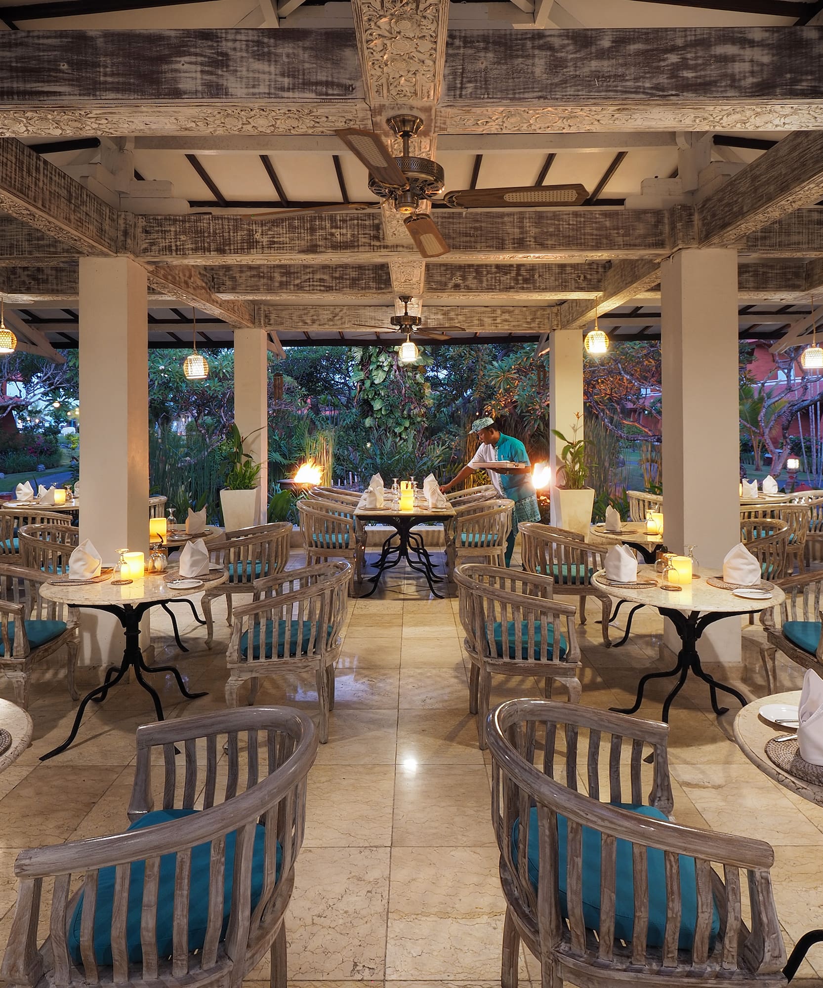 a restaurant with tables and chairs