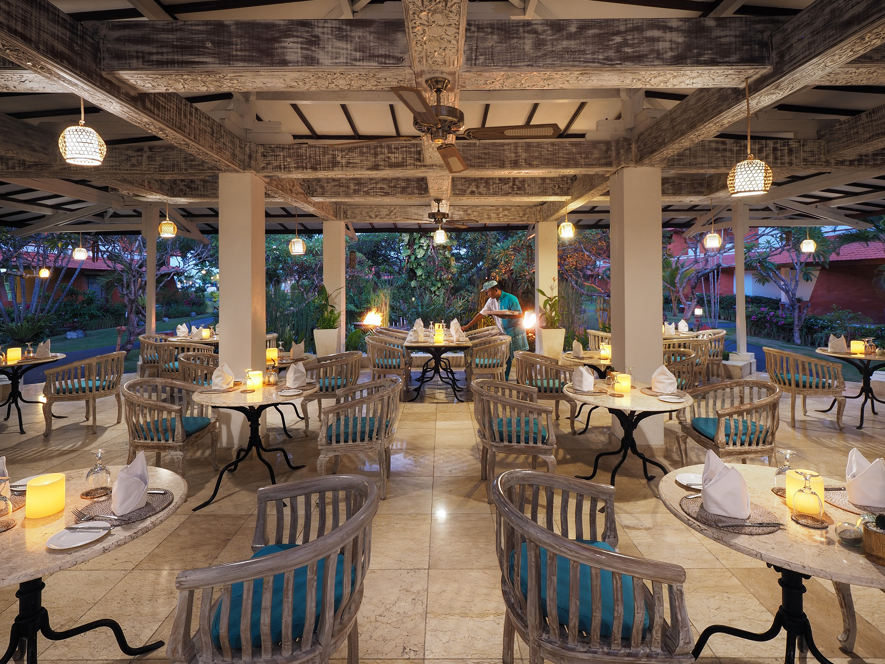 a restaurant with tables and chairs