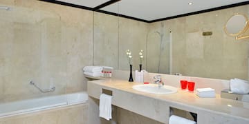 a bathroom with a sink and bathtub
