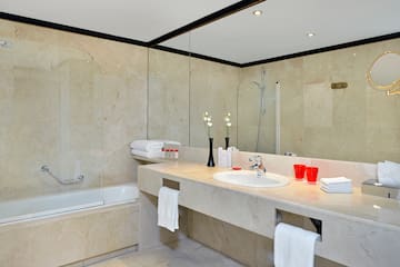 a bathroom with a sink and bathtub