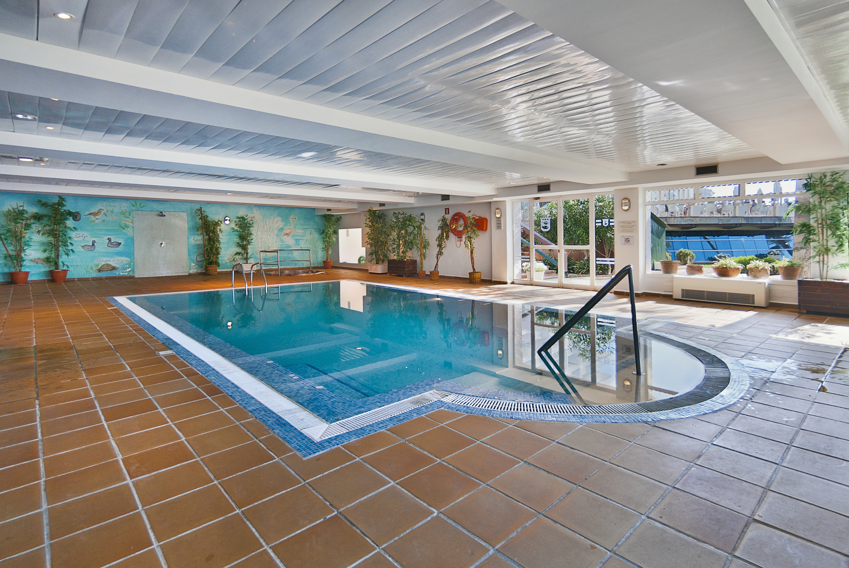 a indoor pool with a staircase