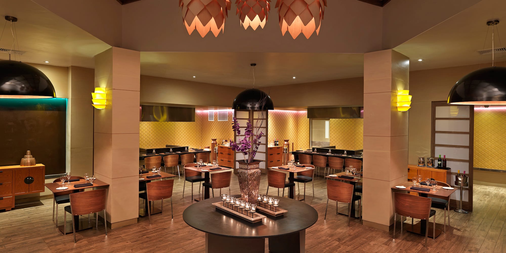 a room with tables and chairs