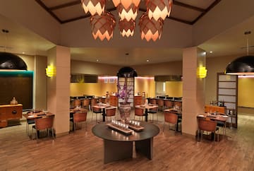 a room with tables and chairs