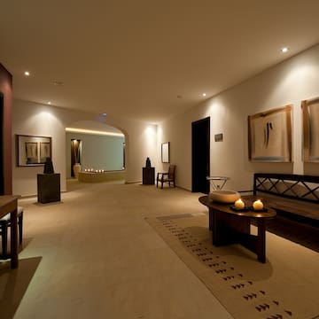 a room with a bench and a table