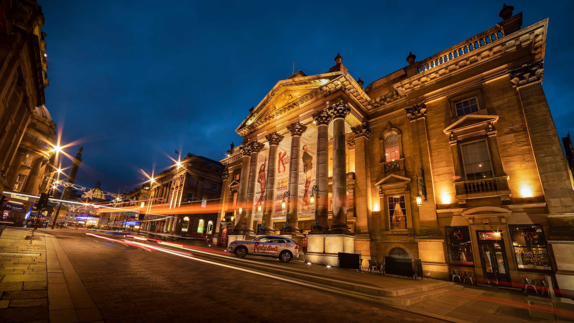 a building with columns and lights