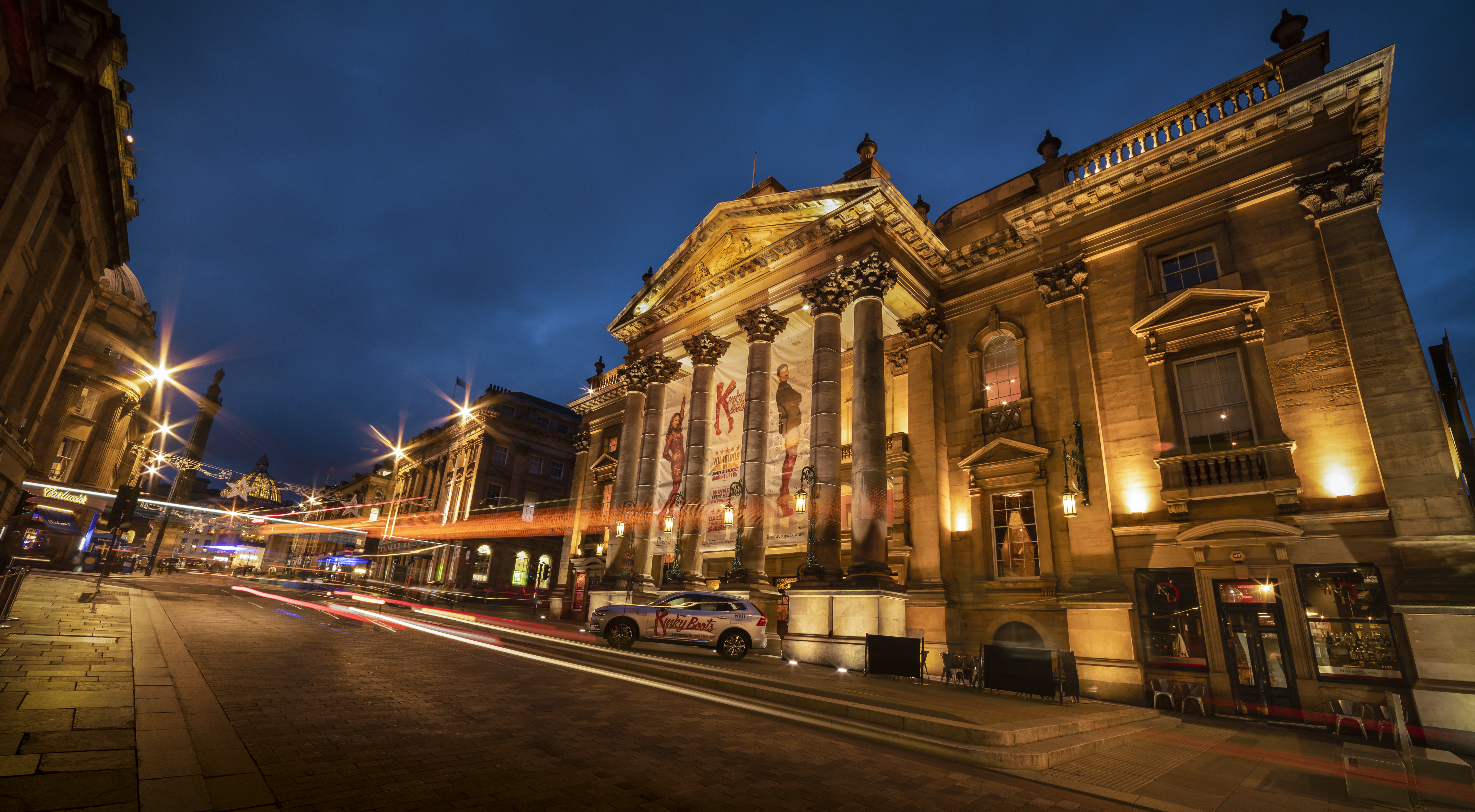 a building with columns and lights