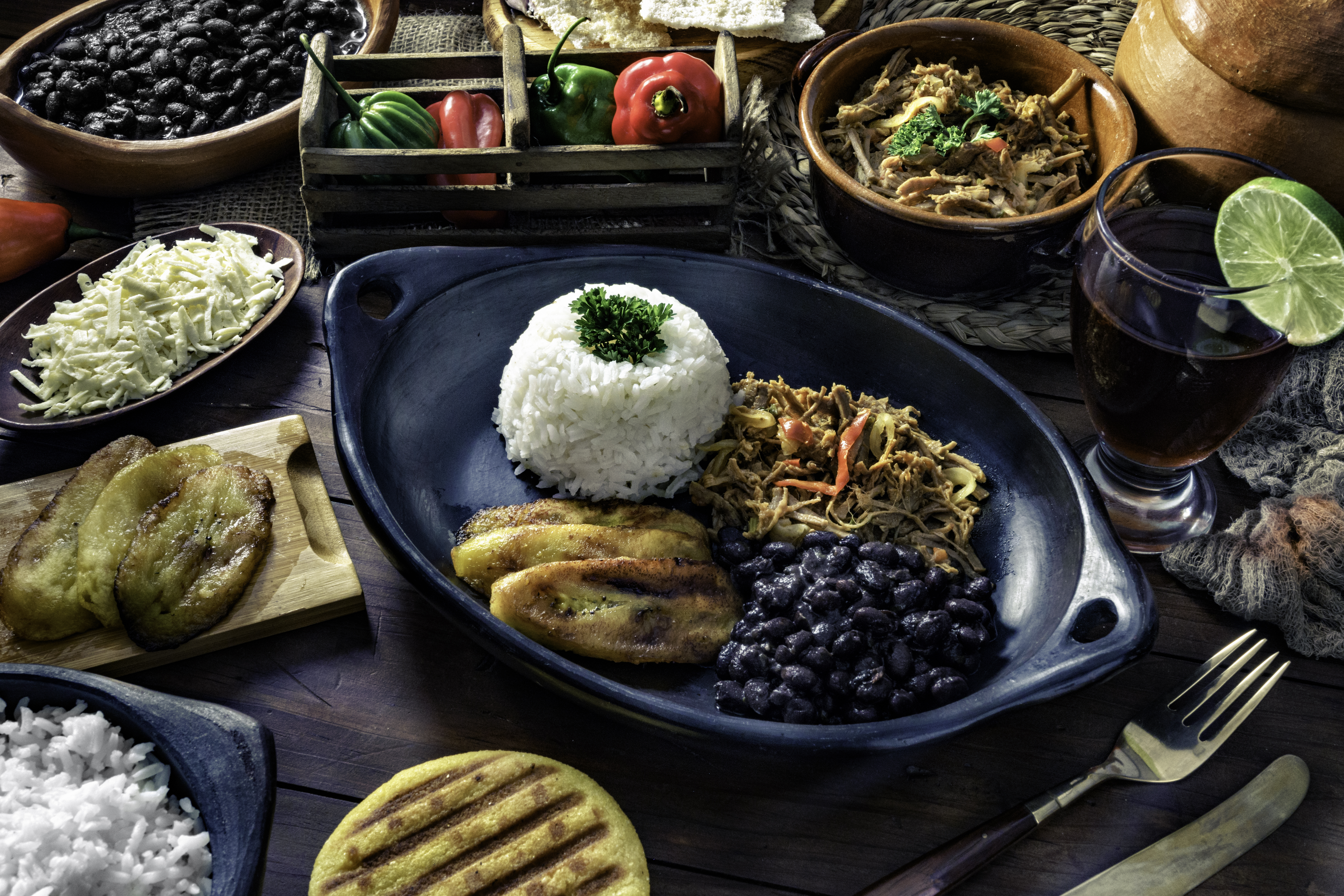 Pabellón Criollo plate with shredded beef, black beans, rice, fried plantains.