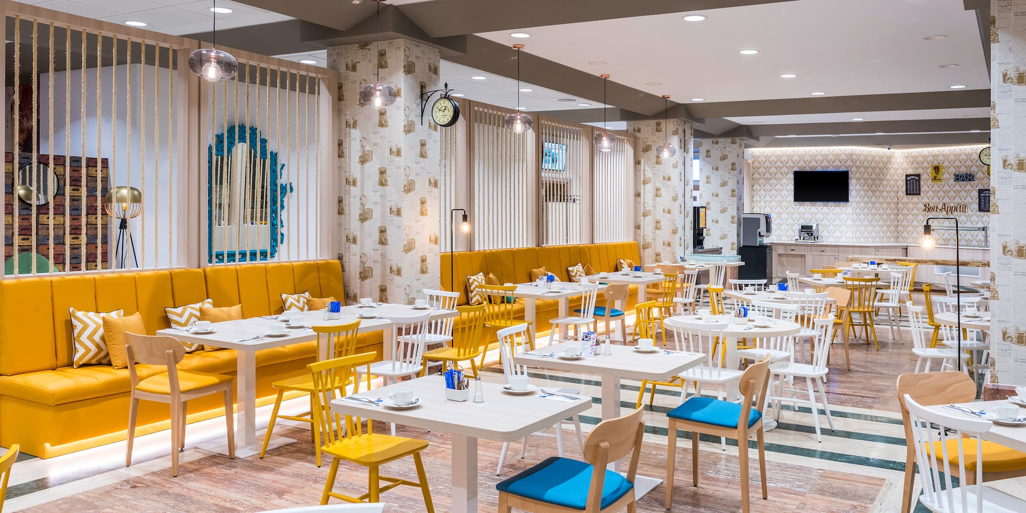 a room with tables and chairs