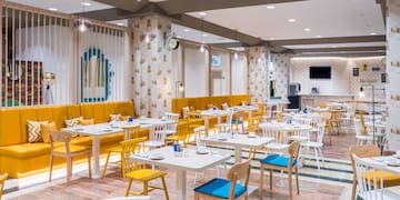 a room with tables and chairs