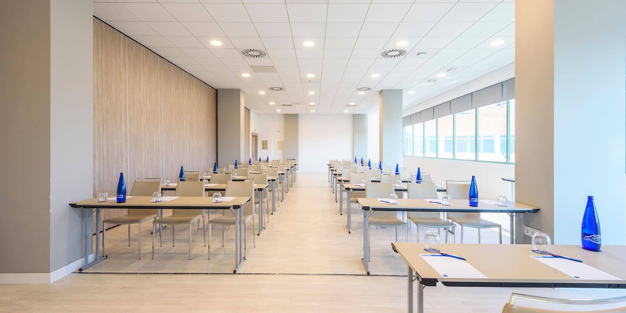 a room with tables and chairs