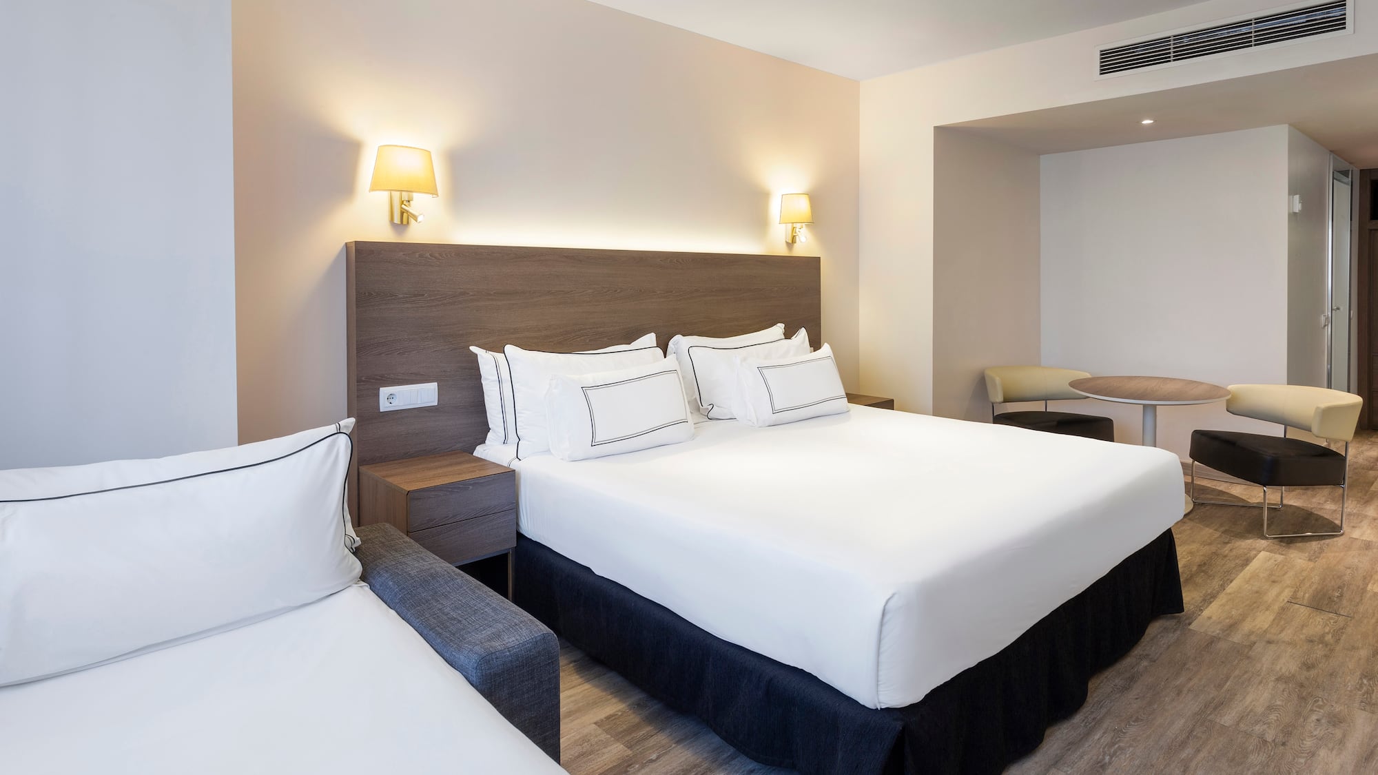 a room with a bed and a table