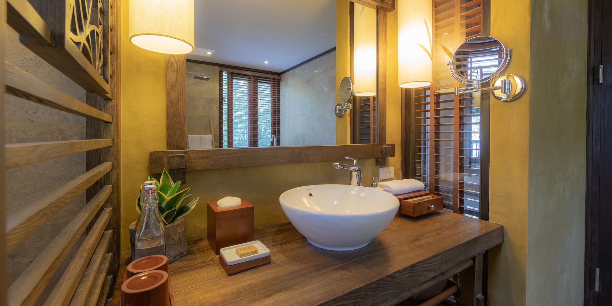a bathroom with a sink and mirror
