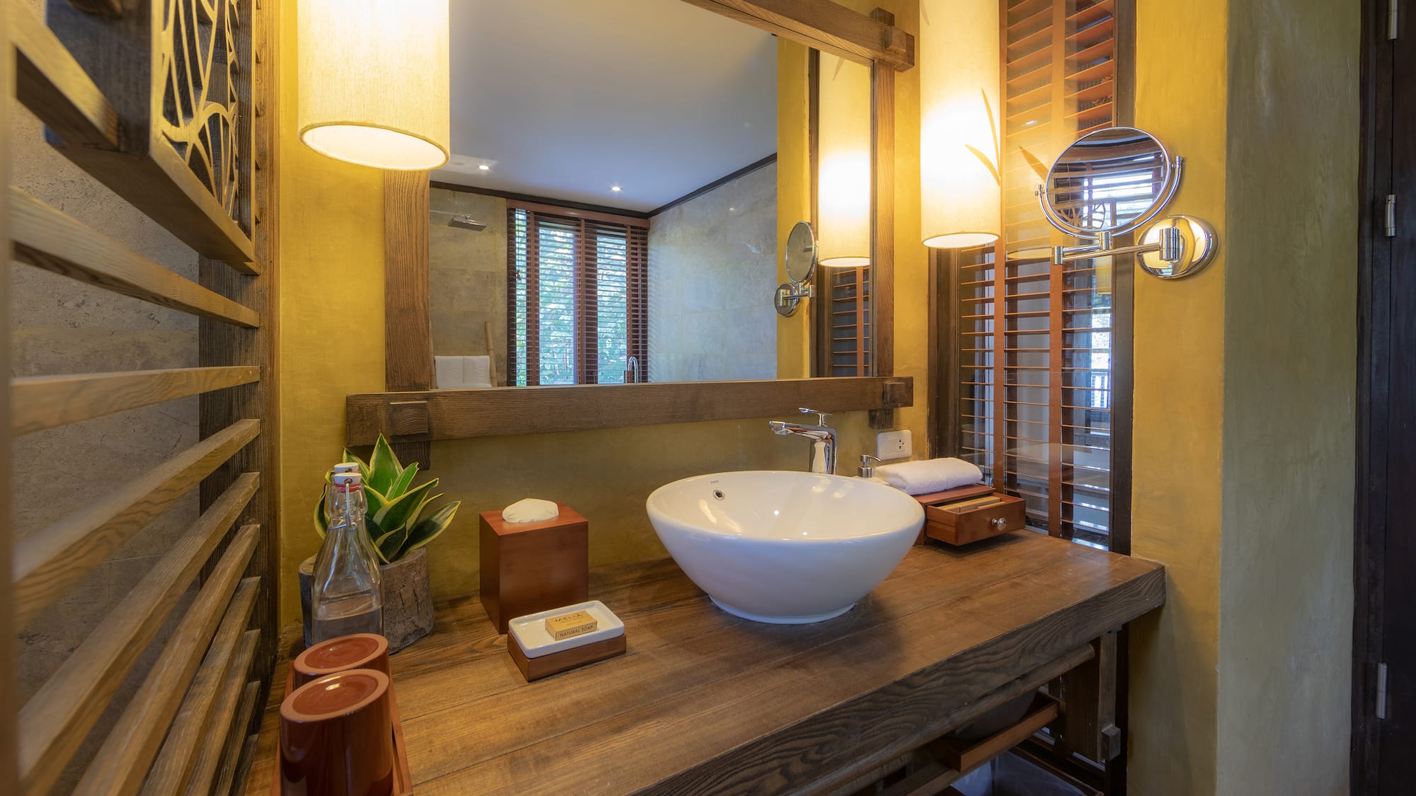 a bathroom with a sink and mirror