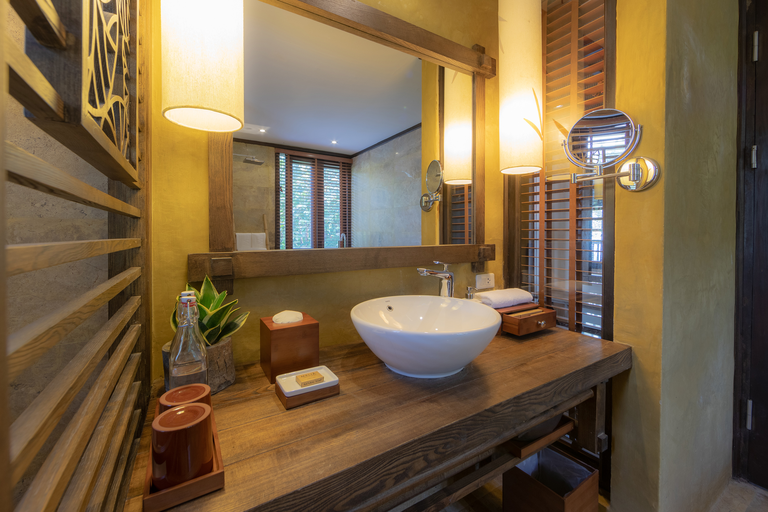 a bathroom with a sink and mirror