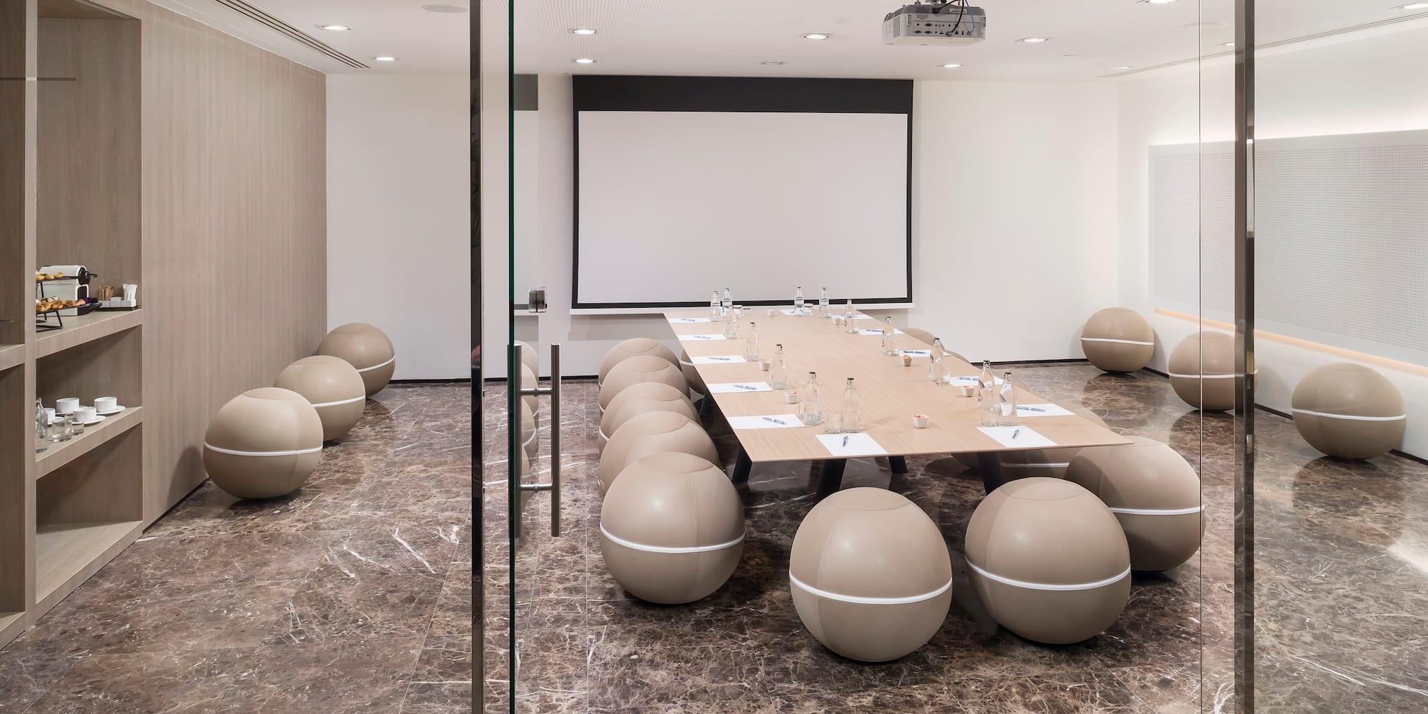 a room with a table and chairs