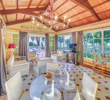 a room with a table and chairs
