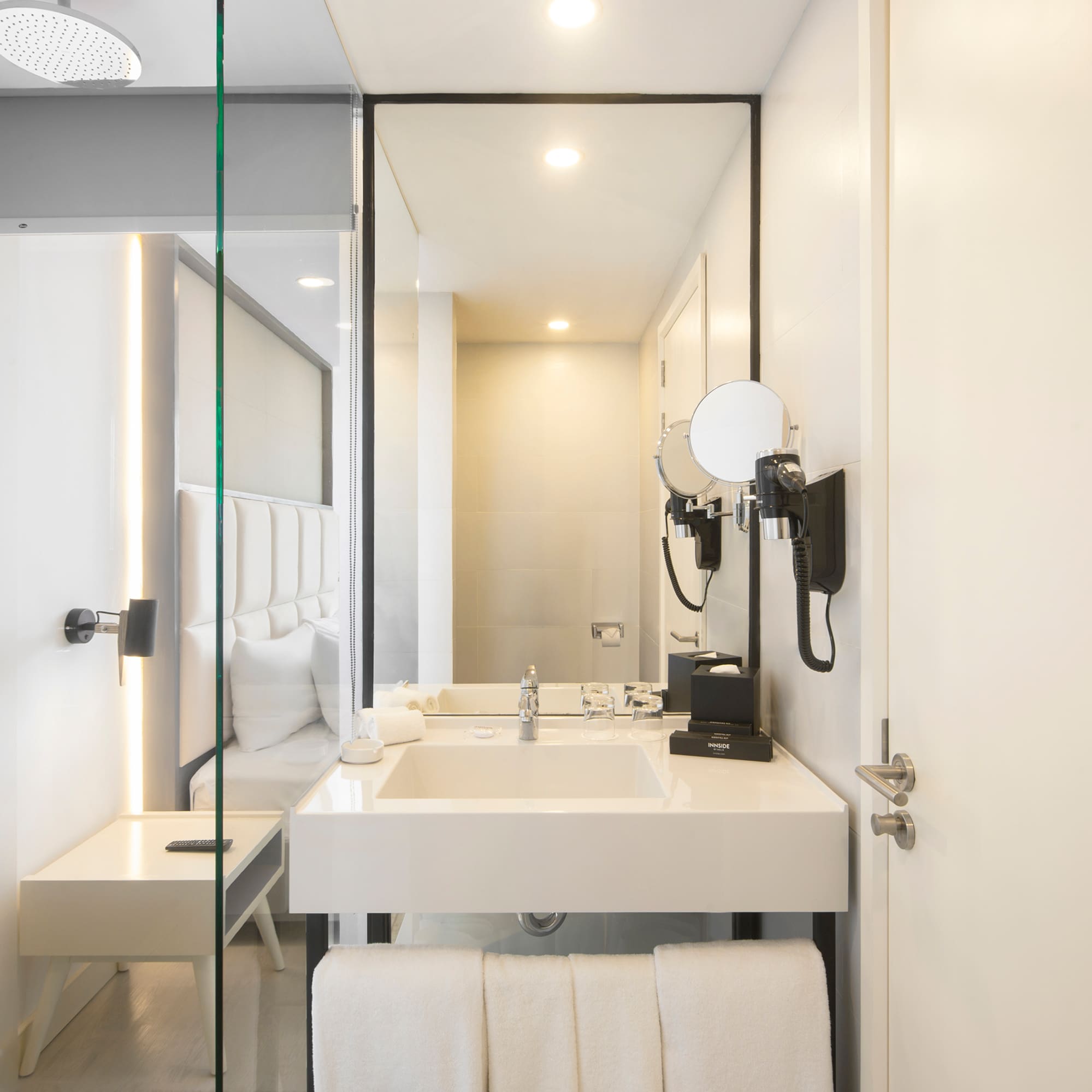 a bathroom with a mirror and sink