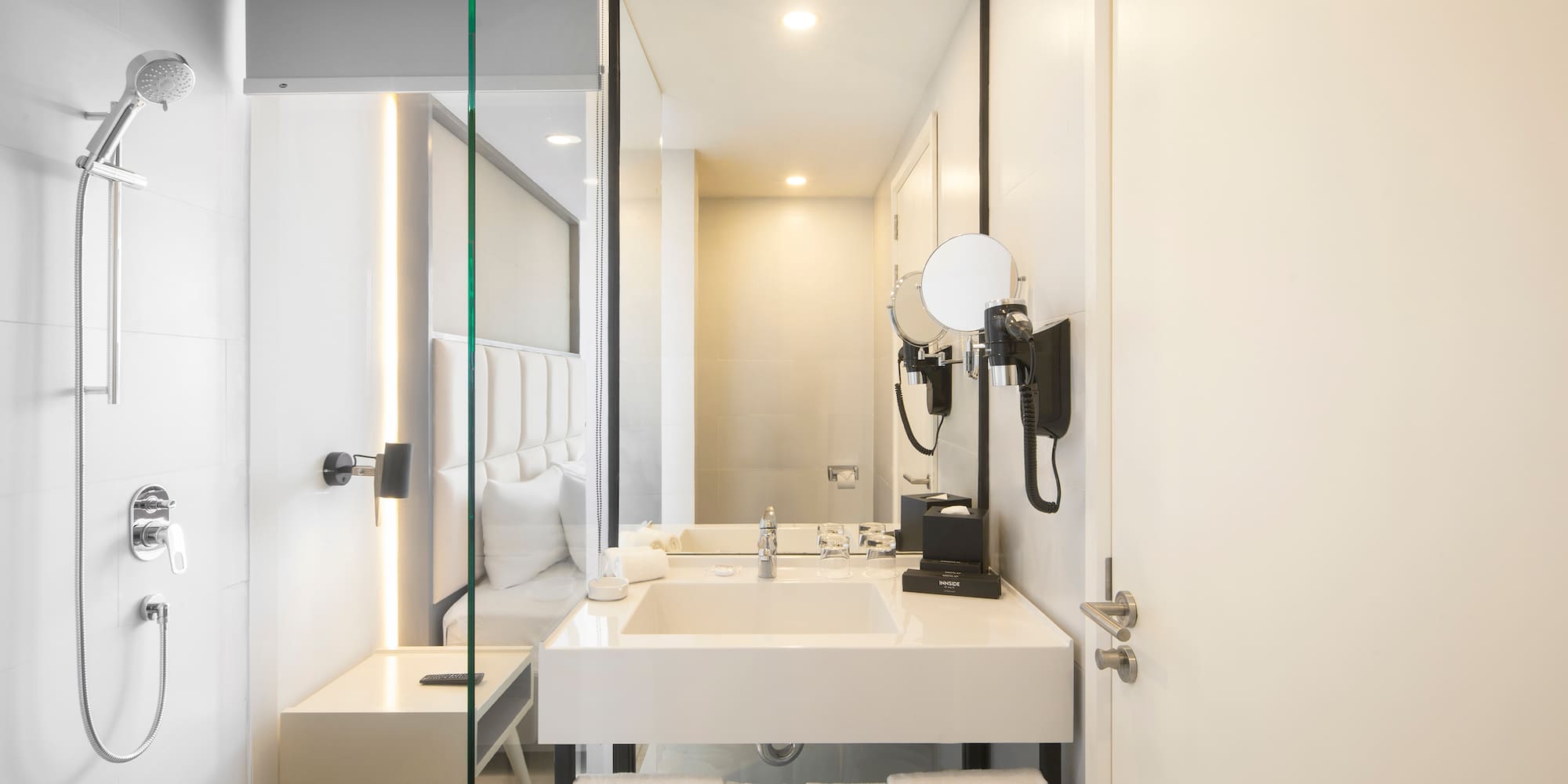 a bathroom with a mirror and sink