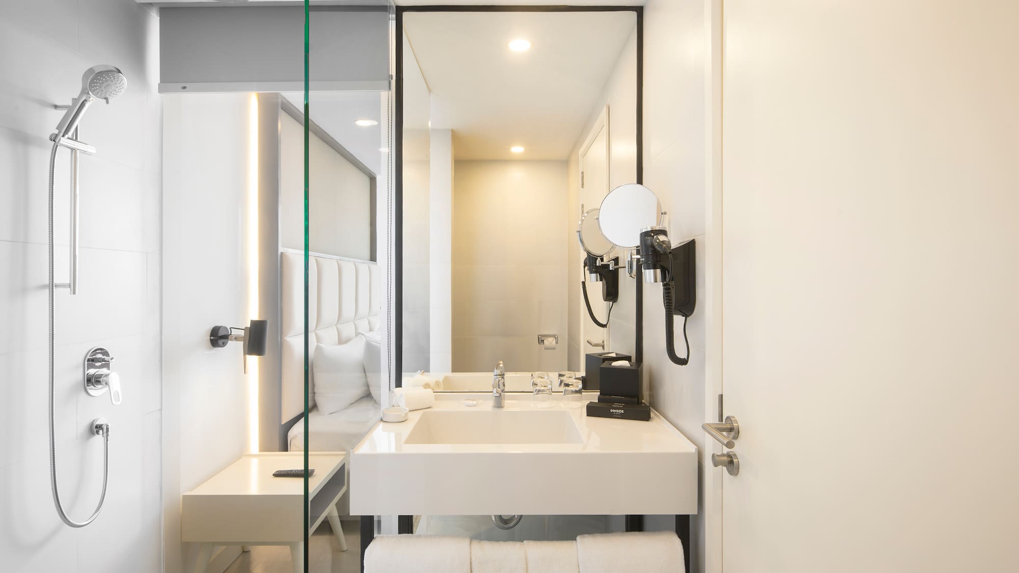 a bathroom with a mirror and sink