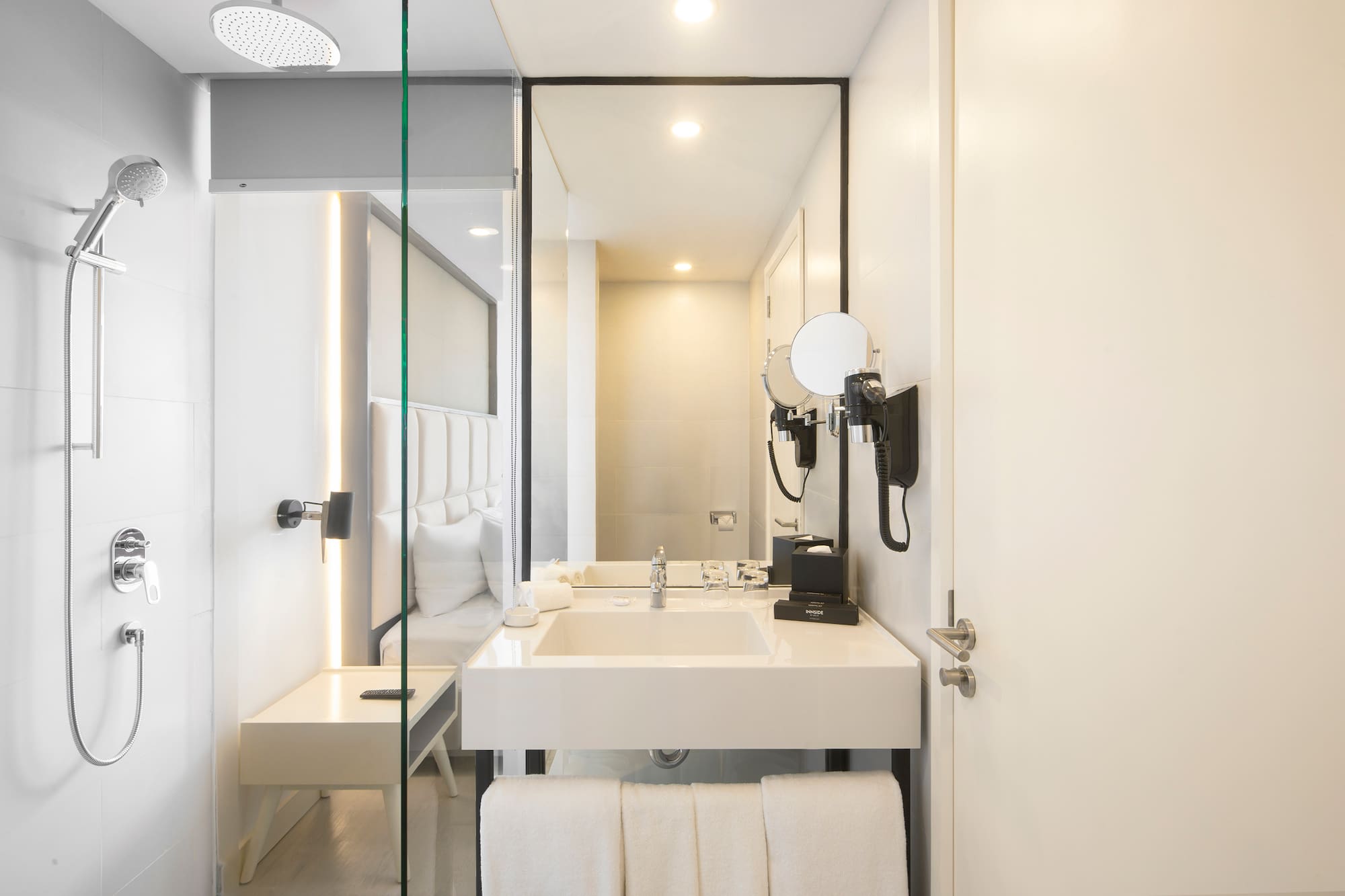a bathroom with a mirror and sink
