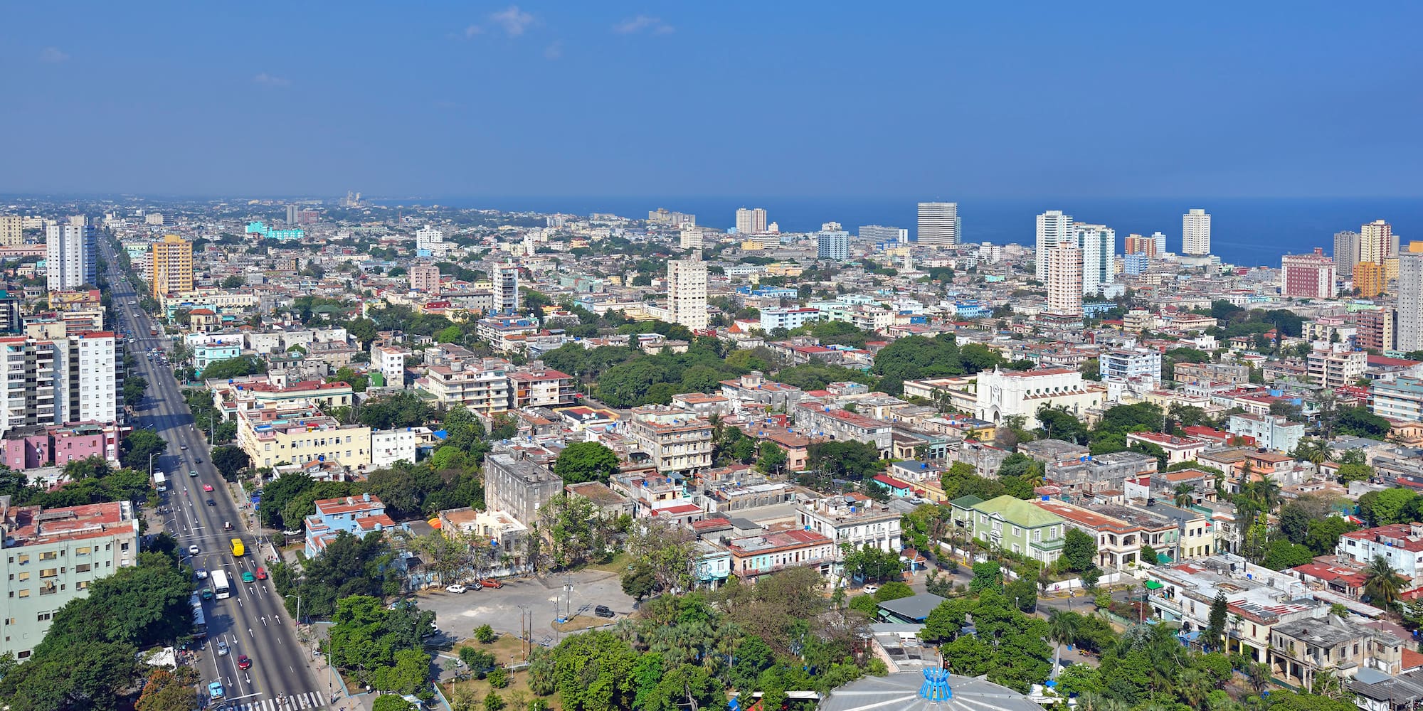 a city with many buildings and a road