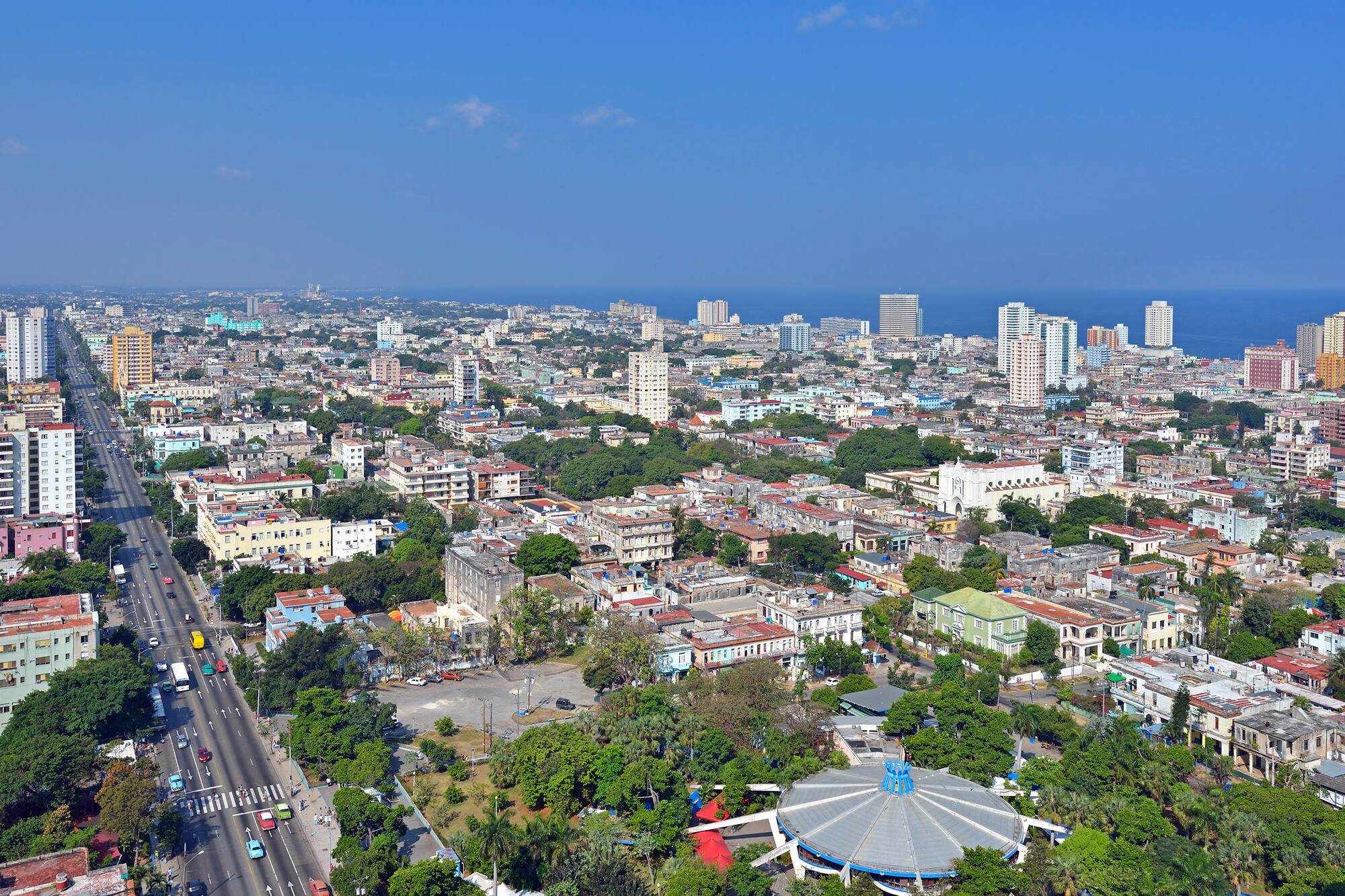 a city with many buildings and a road