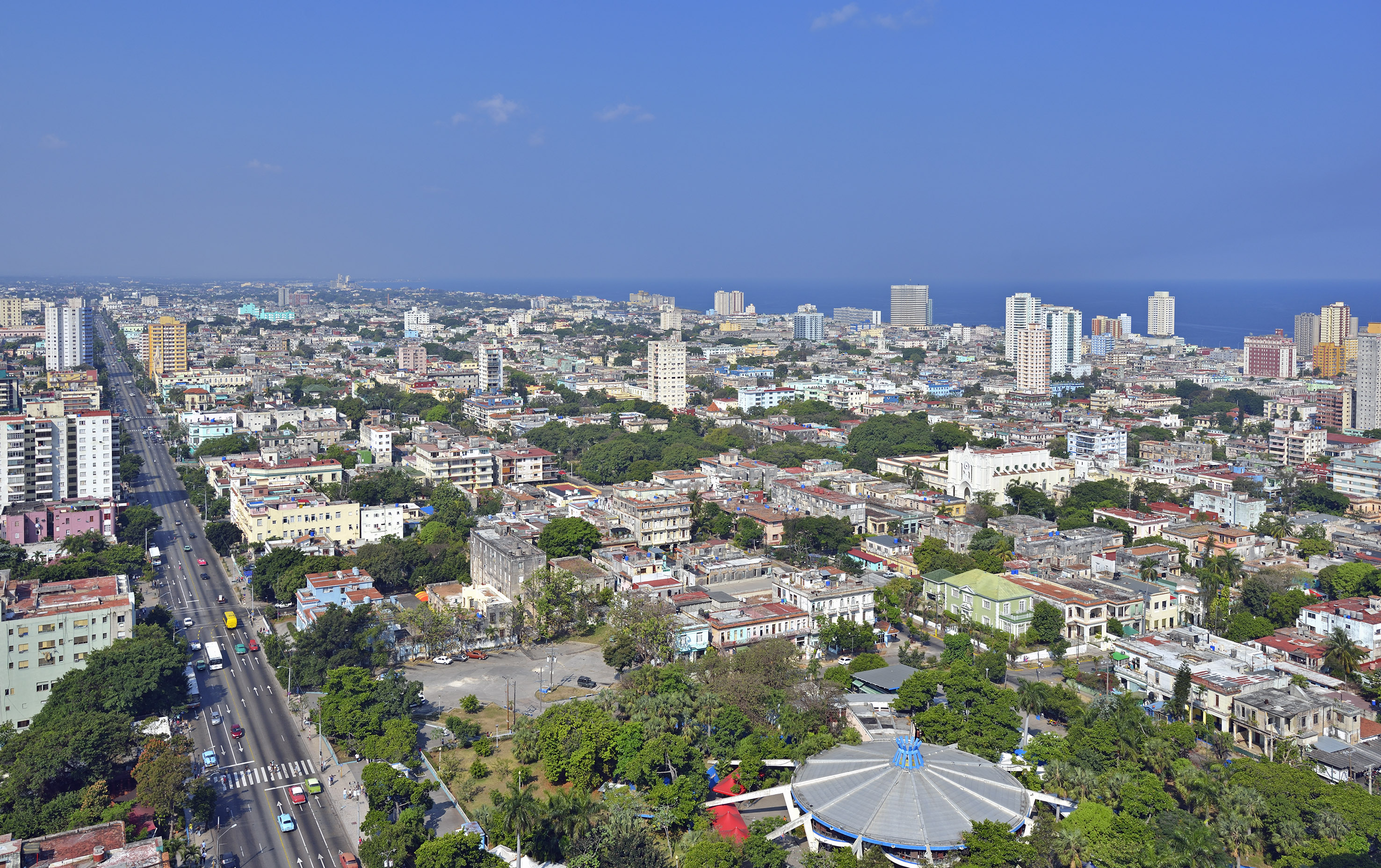 a city with many buildings and a road