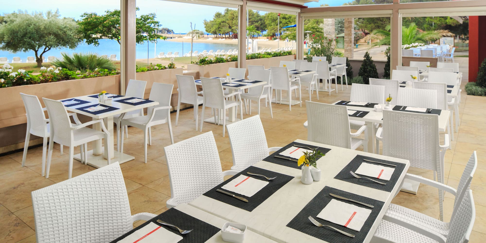 a restaurant with tables and chairs