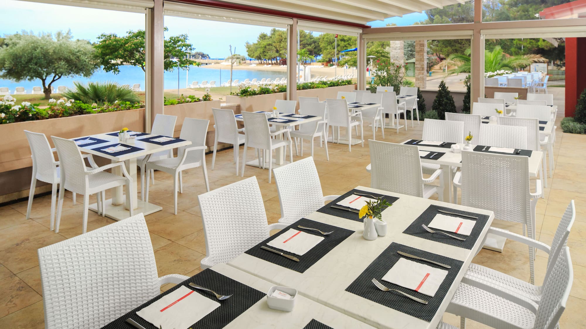 a restaurant with tables and chairs