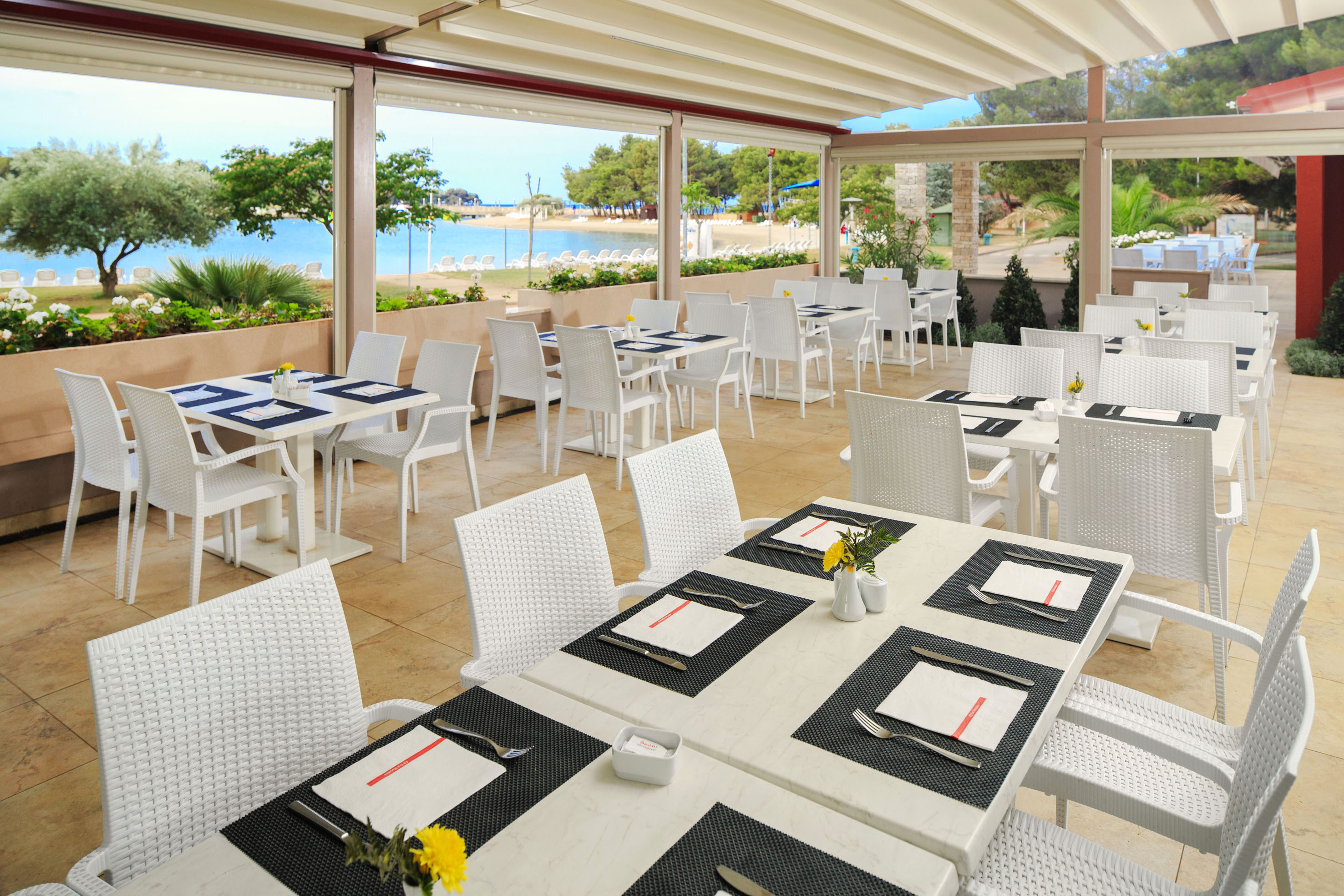 a restaurant with tables and chairs