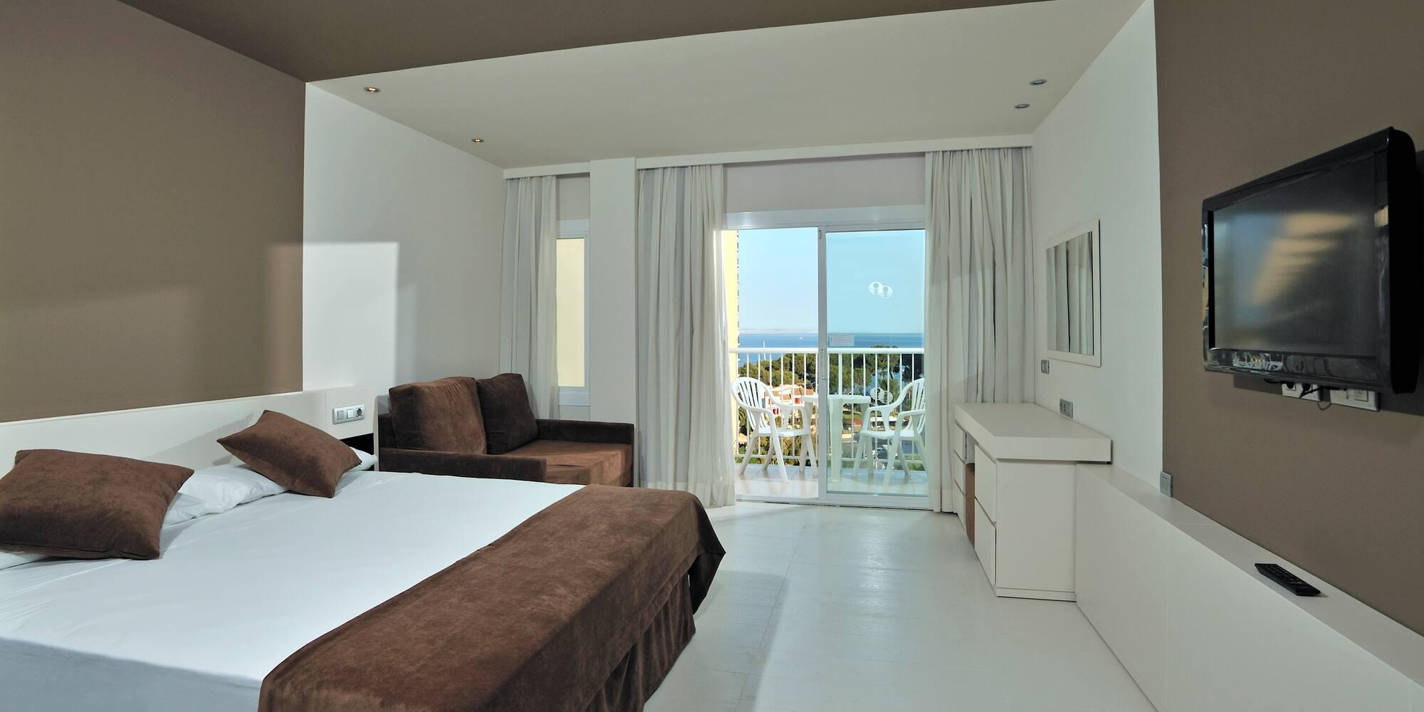 a room with a bed and a couch