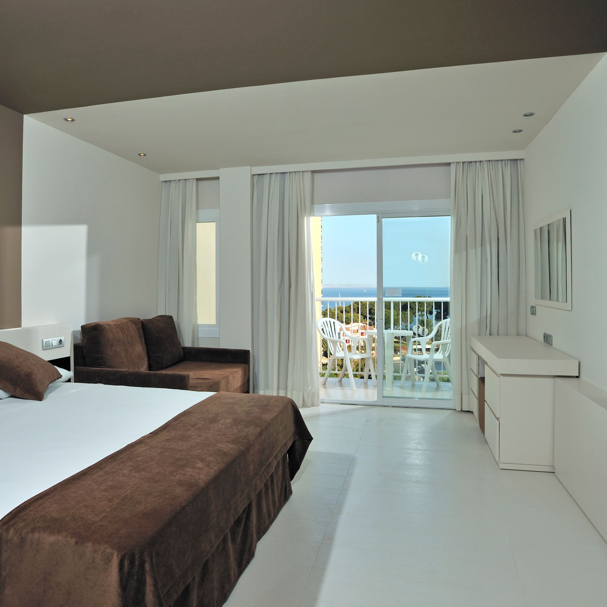 a room with a bed and a couch