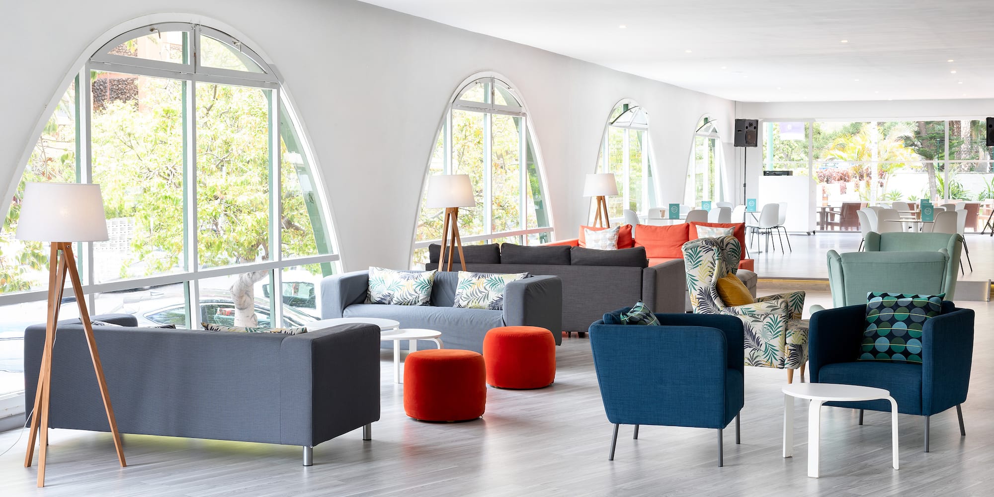 a room with couches and tables