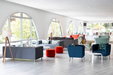 a room with couches and tables