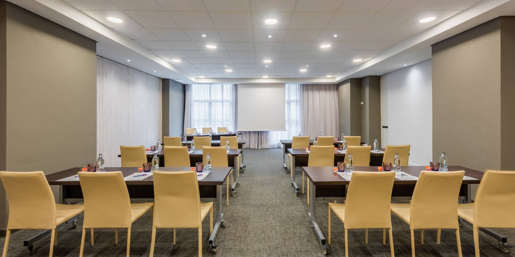 a room with tables and chairs