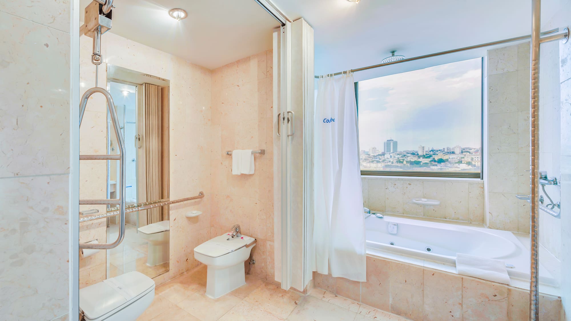 a bathroom with a bathtub and shower