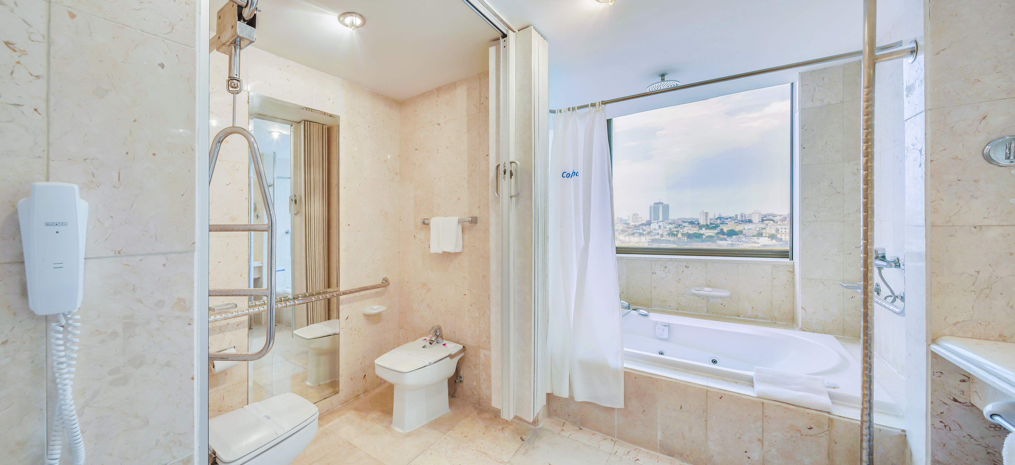 a bathroom with a bathtub and shower