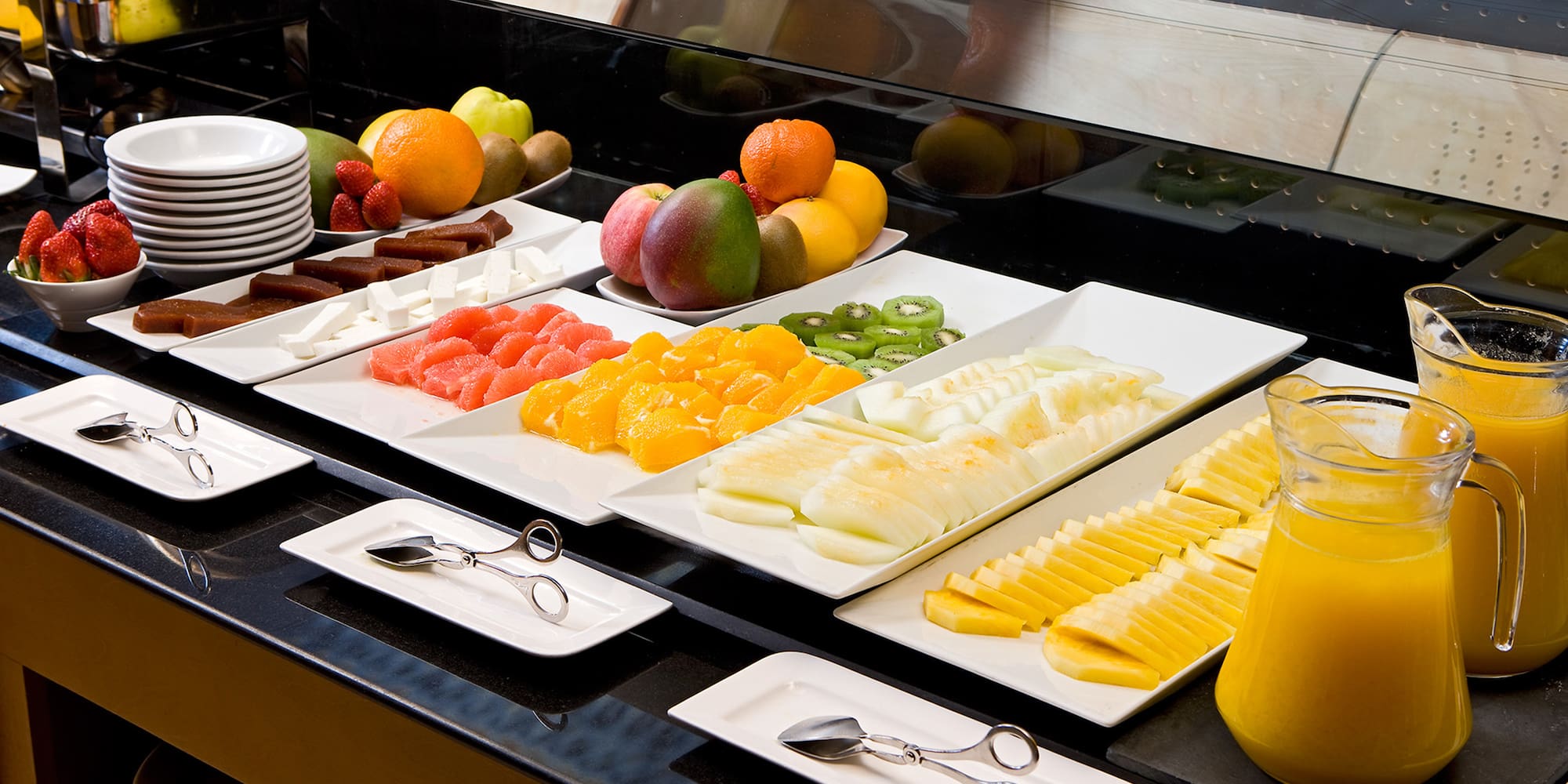 a trays of fruit on a table
