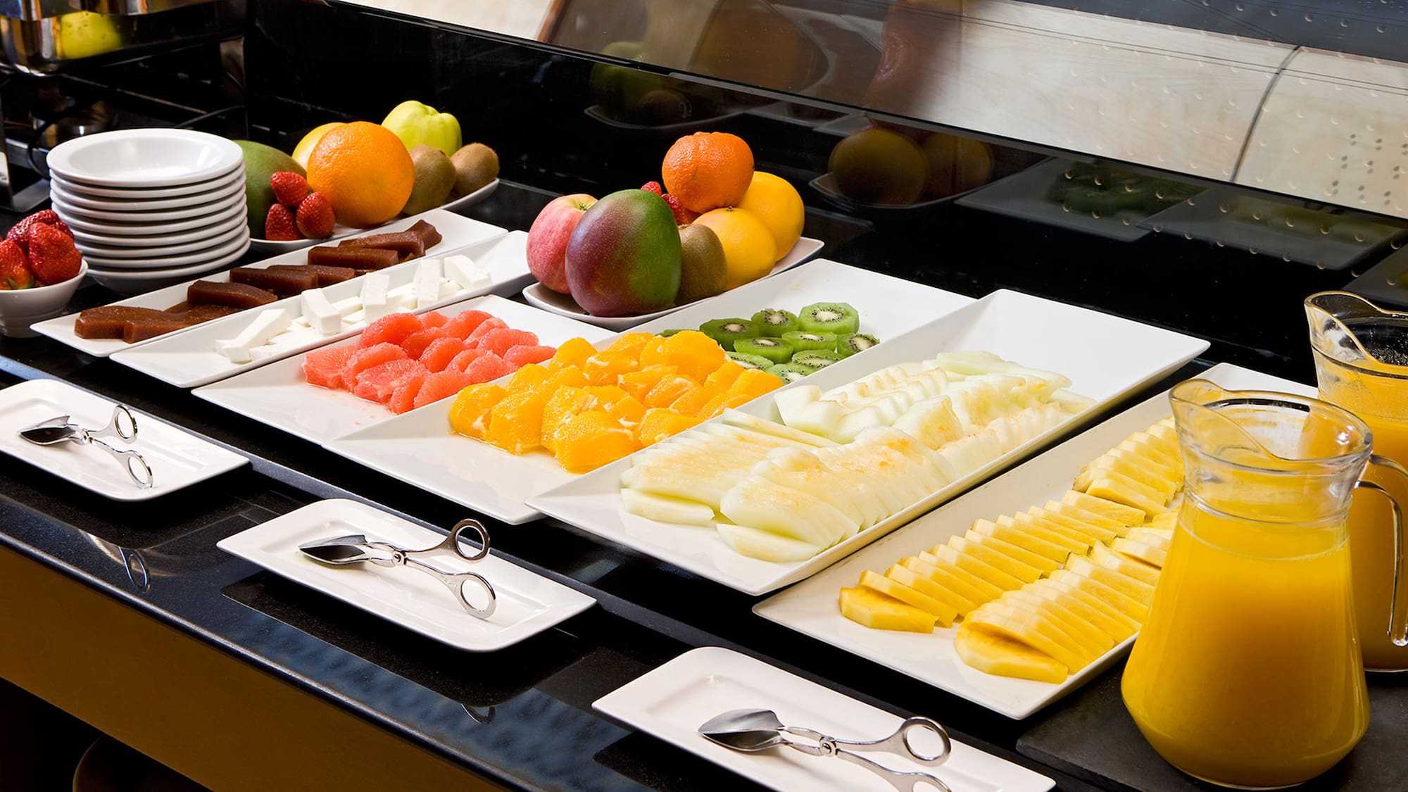 a trays of fruit on a table