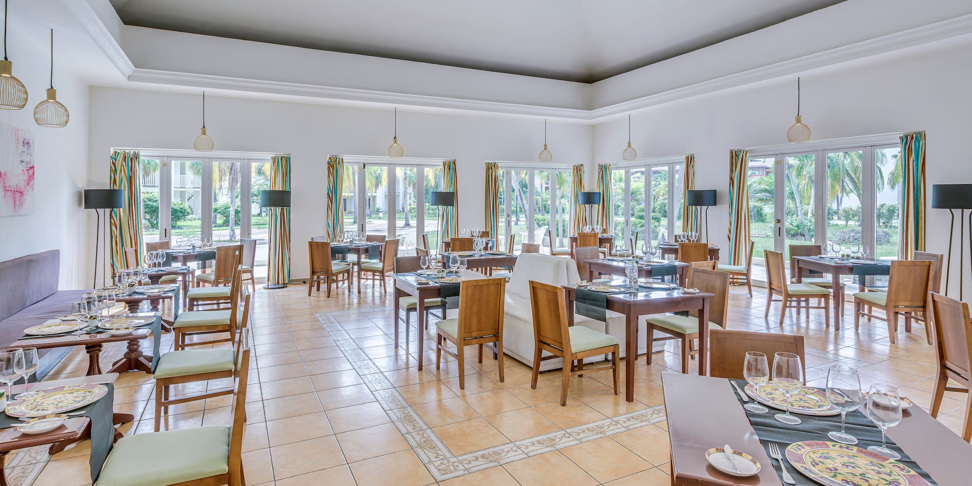 a room with tables and chairs