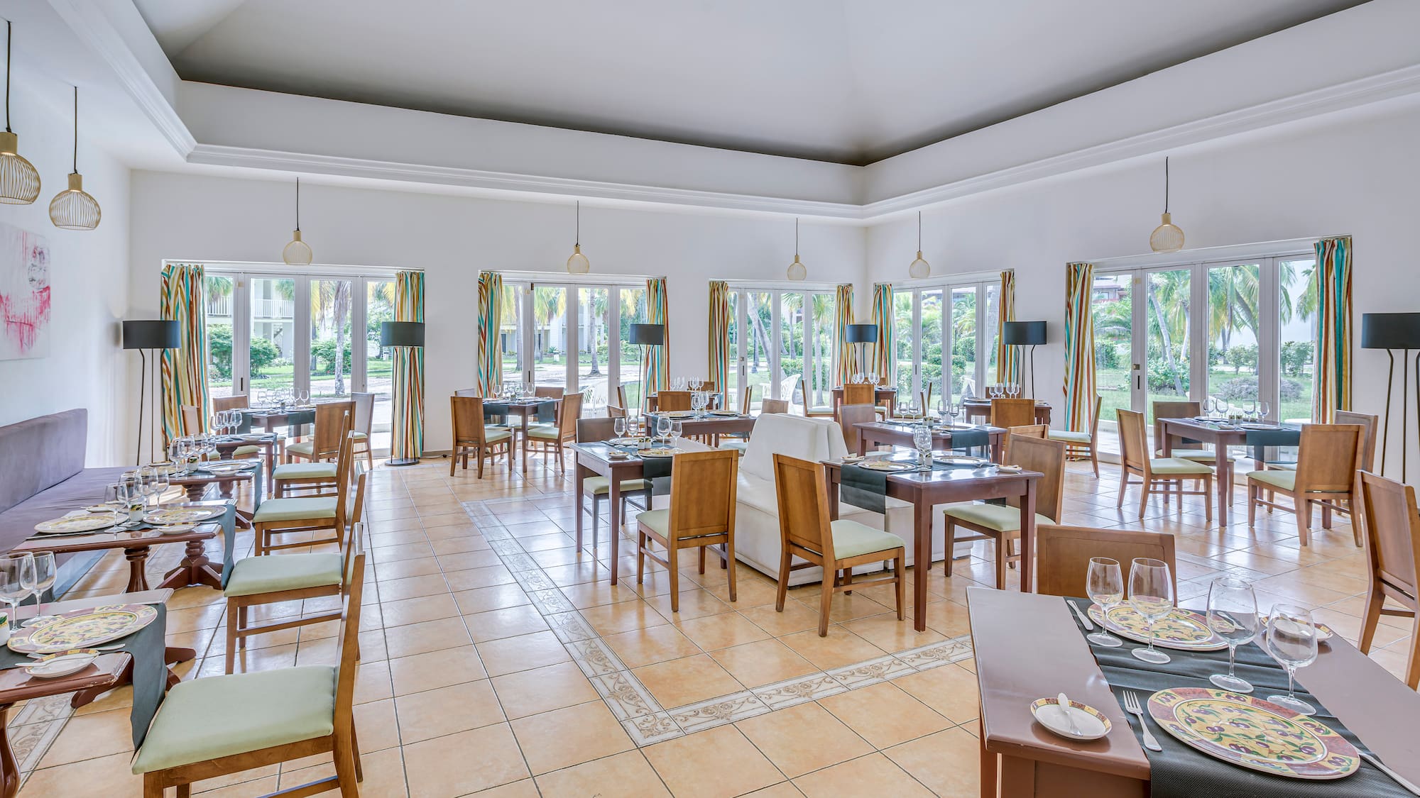 a room with tables and chairs